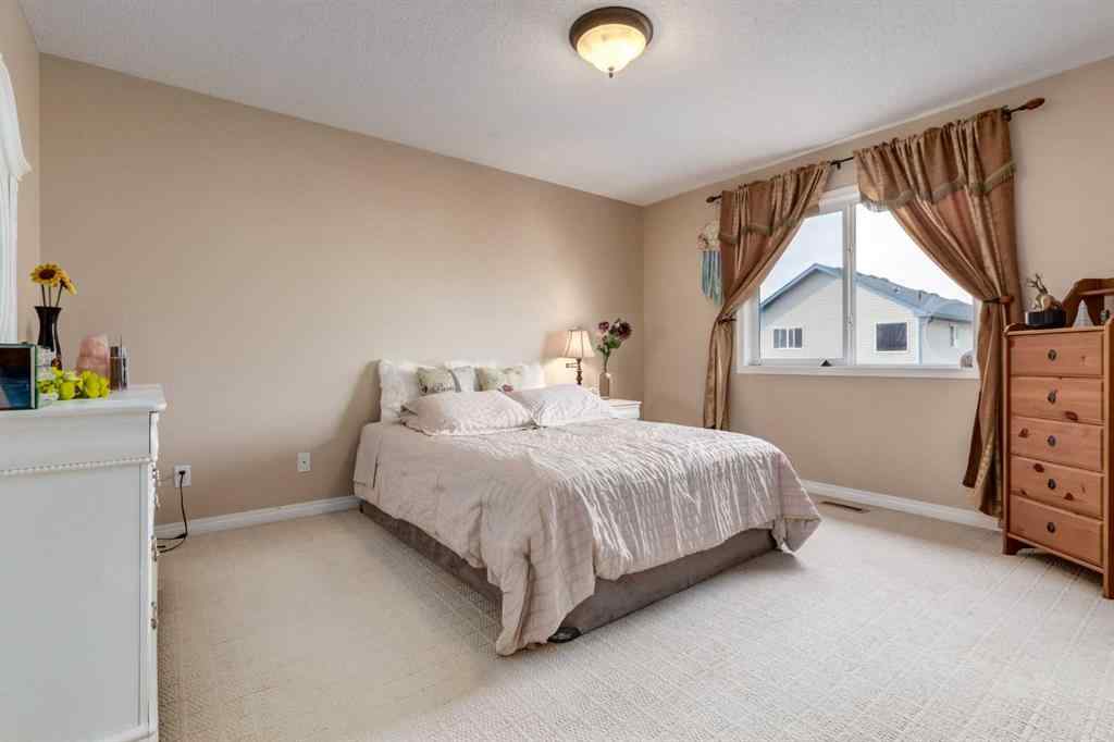 MLS® A2256377 - 82 Everglen Crescent SW in Evergreen Calgary, Residential