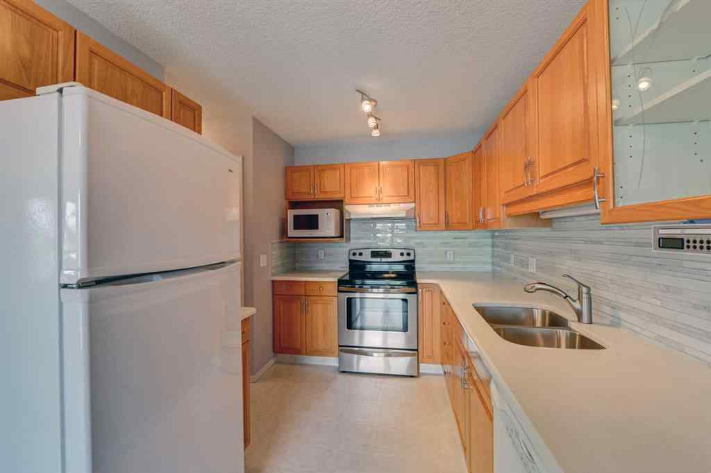 MLS® A2256378 - 155 Macewan Ridge Villas NW in MacEwan Glen Calgary, Residential