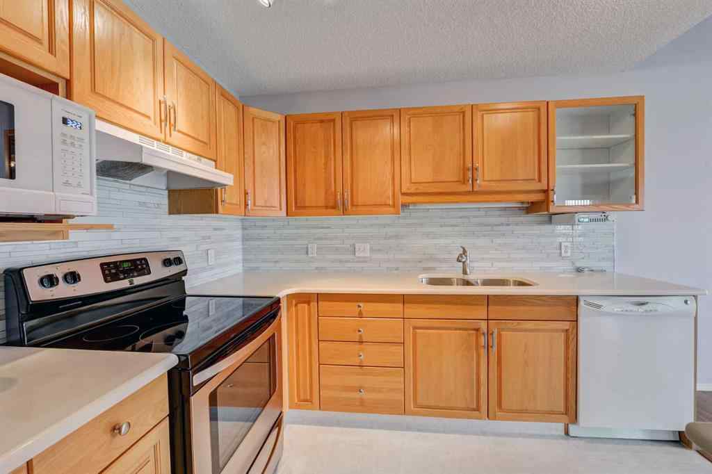 MLS® A2256378 - 155 Macewan Ridge Villas NW in MacEwan Glen Calgary, Residential