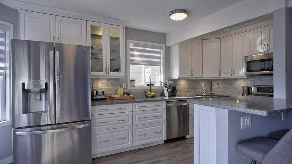 MLS® A2256383 - Unit #9 567 Edmonton Trail NE in Edmonton Trail Airdrie, Residential