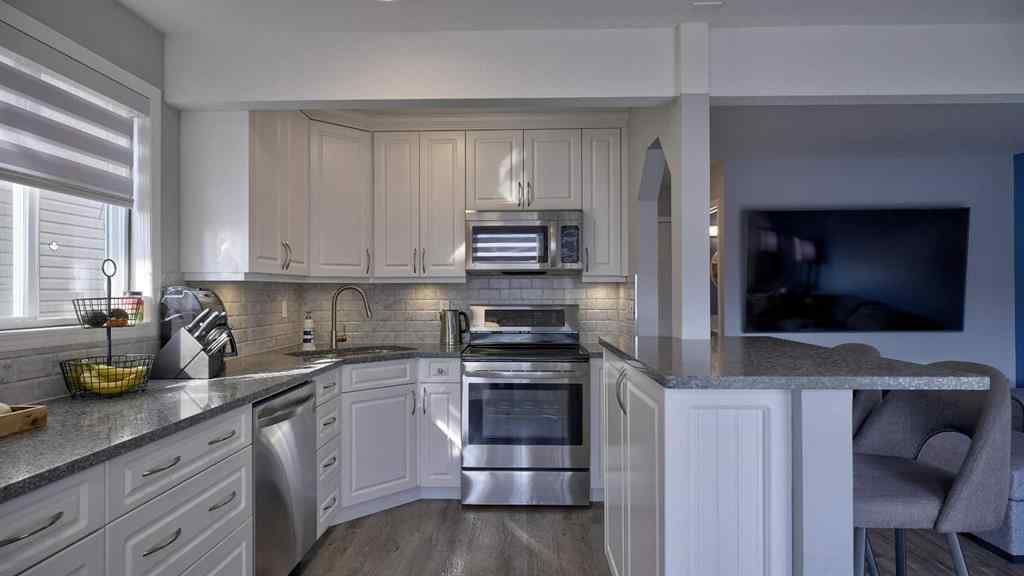 MLS® A2256383 - Unit #9 567 Edmonton Trail NE in Edmonton Trail Airdrie, Residential