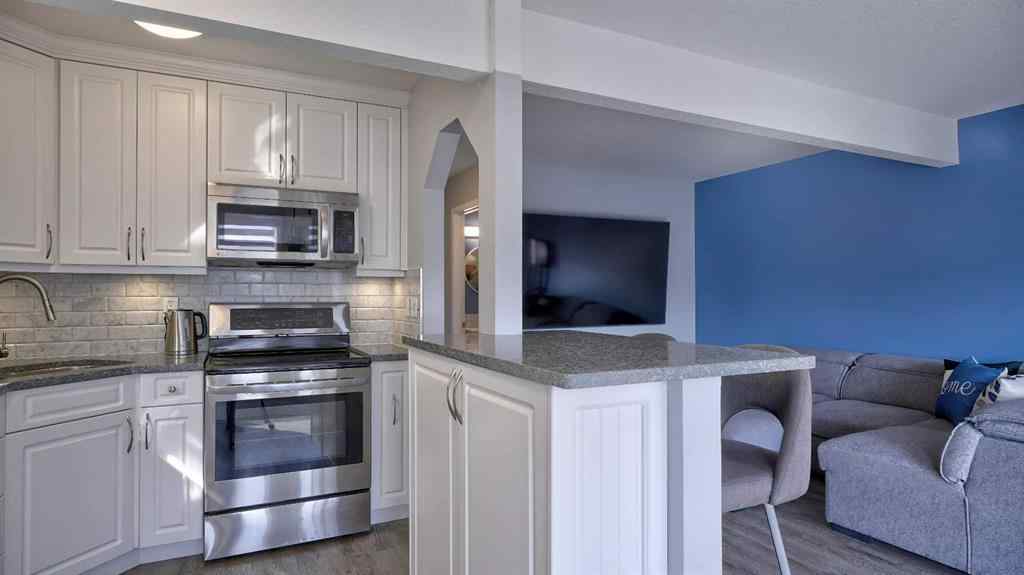 MLS® A2256383 - Unit #9 567 Edmonton Trail NE in Edmonton Trail Airdrie, Residential