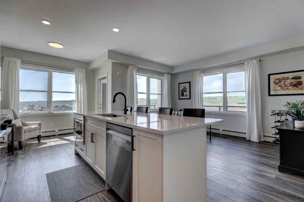 MLS® A2256391 - Unit #405 125 Wolf Hollow Crescent SE in Wolf Willow Calgary, Residential