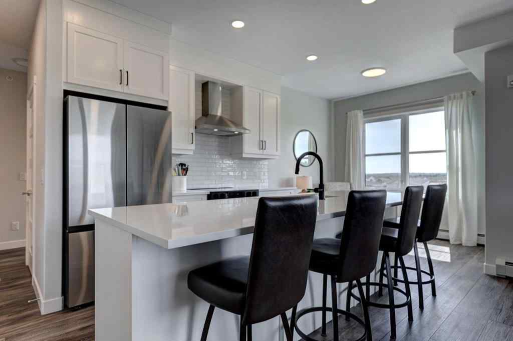 MLS® A2256391 - Unit #405 125 Wolf Hollow Crescent SE in Wolf Willow Calgary, Residential