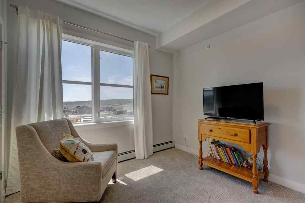 MLS® A2256391 - Unit #405 125 Wolf Hollow Crescent SE in Wolf Willow Calgary, Residential