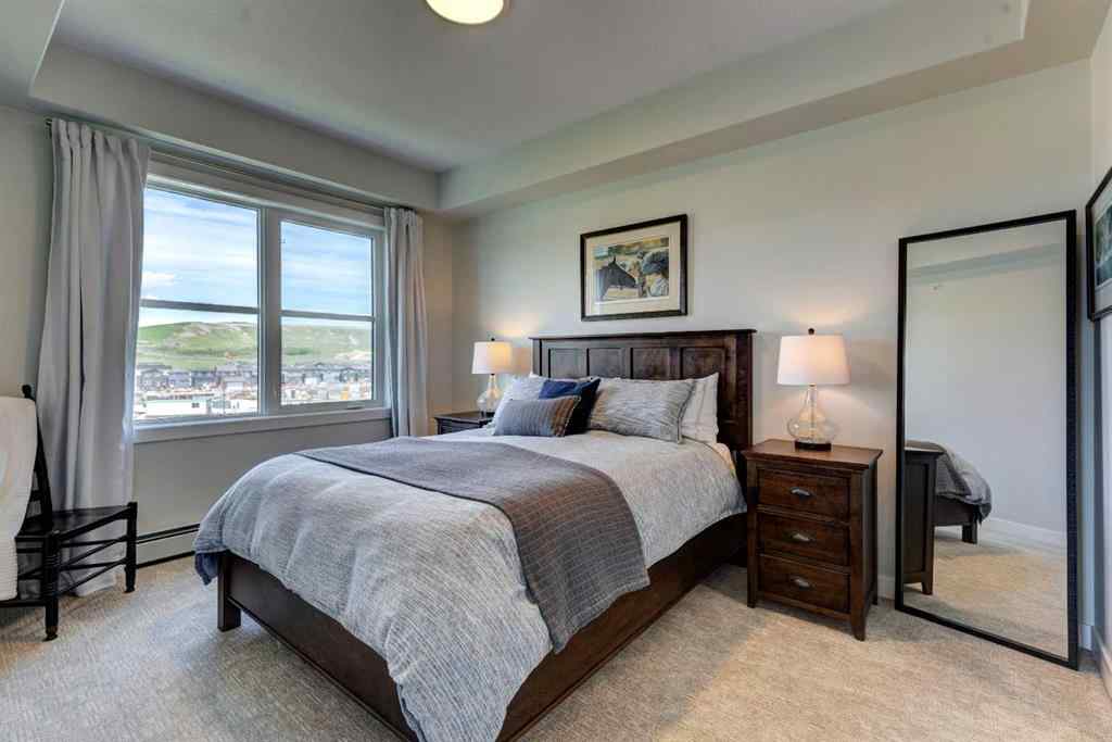 MLS® A2256391 - Unit #405 125 Wolf Hollow Crescent SE in Wolf Willow Calgary, Residential