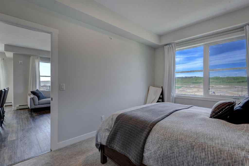MLS® A2256391 - Unit #405 125 Wolf Hollow Crescent SE in Wolf Willow Calgary, Residential
