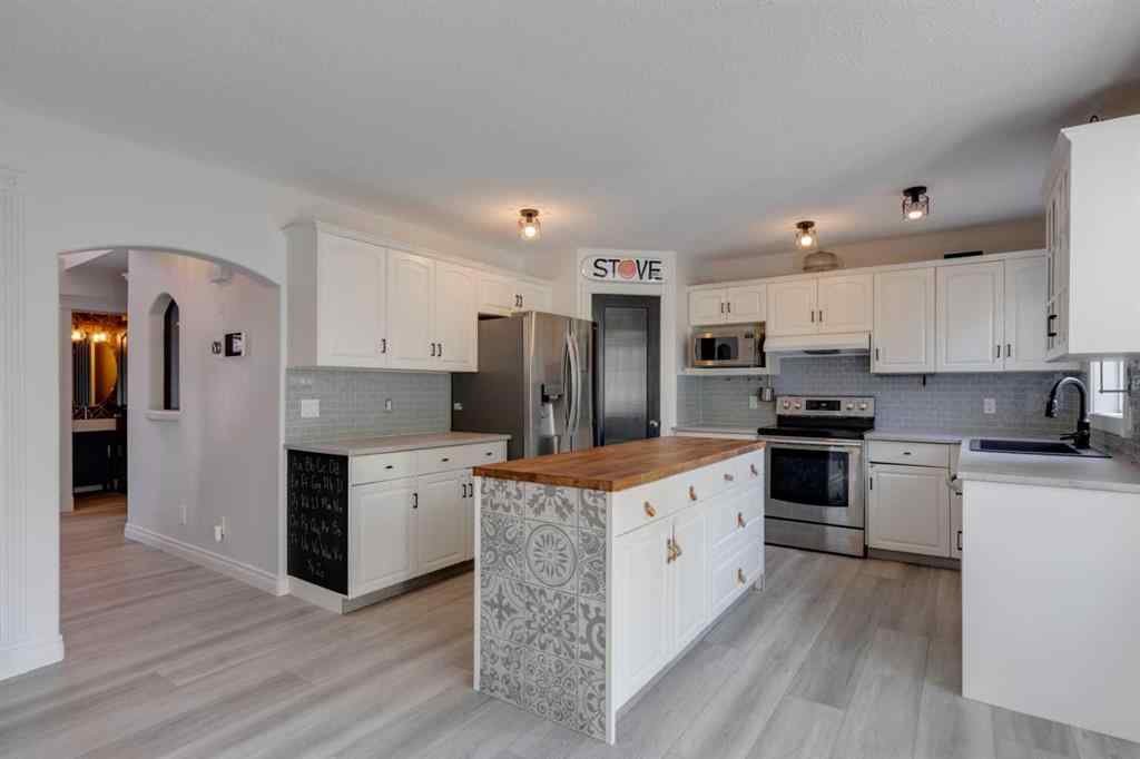 MLS® A2256397 - 1374 Strathcona Drive SW in Strathcona Park Calgary, Residential