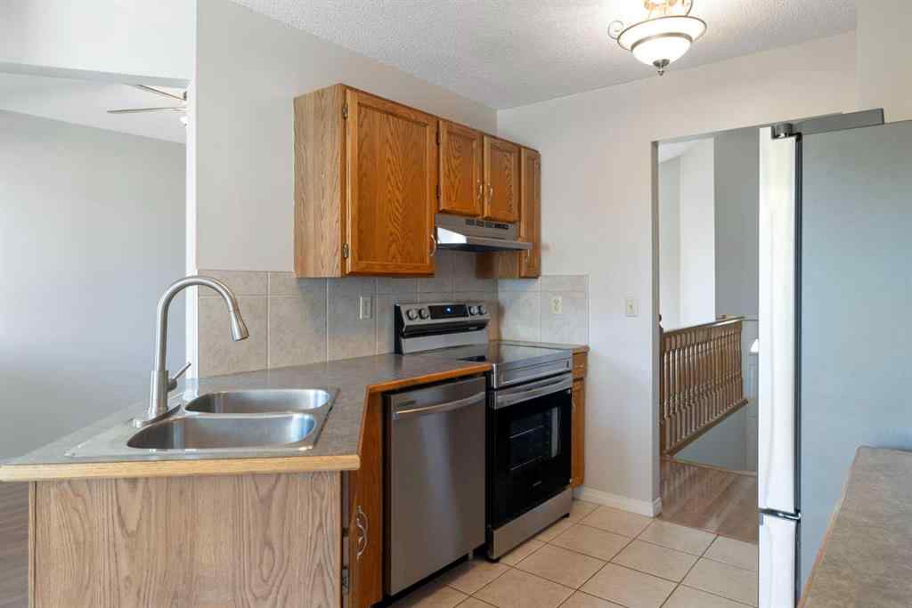 MLS® A2256408 - 28 Millrise Close SW in Millrise Calgary, Residential
