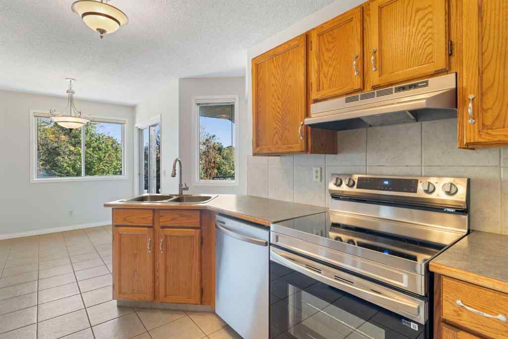 MLS® A2256408 - 28 Millrise Close SW in Millrise Calgary, Residential