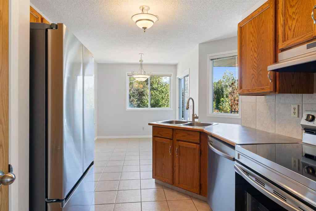 MLS® A2256408 - 28 Millrise Close SW in Millrise Calgary, Residential