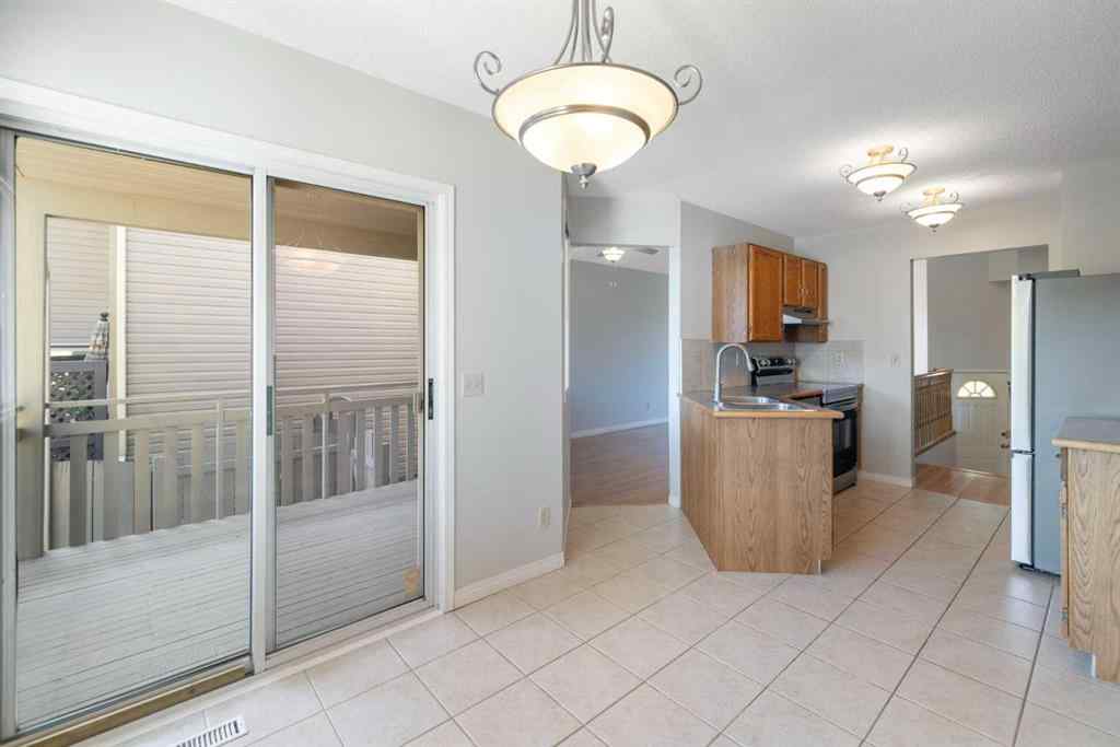 MLS® A2256408 - 28 Millrise Close SW in Millrise Calgary, Residential
