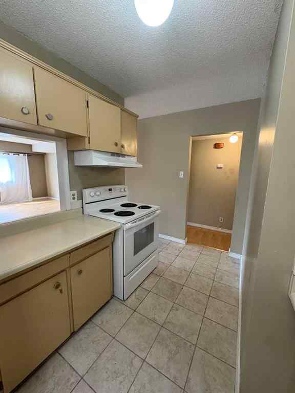 MLS® A2256420 - Unit #1-6 1608 38 Street SW in Rosscarrock Calgary, Multi-Family