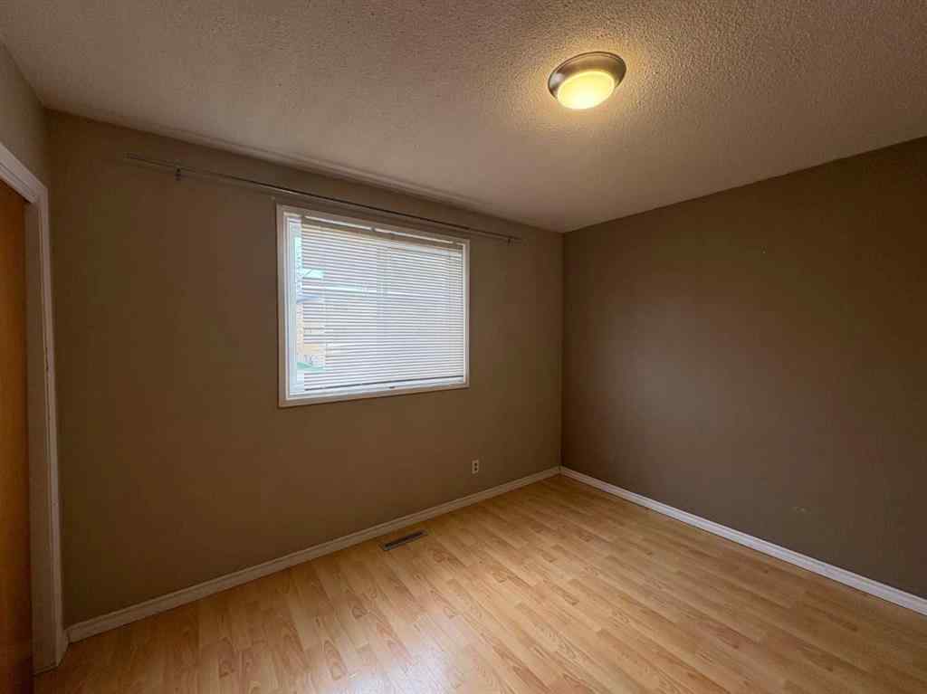 MLS® A2256420 - Unit #1-6 1608 38 Street SW in Rosscarrock Calgary, Multi-Family
