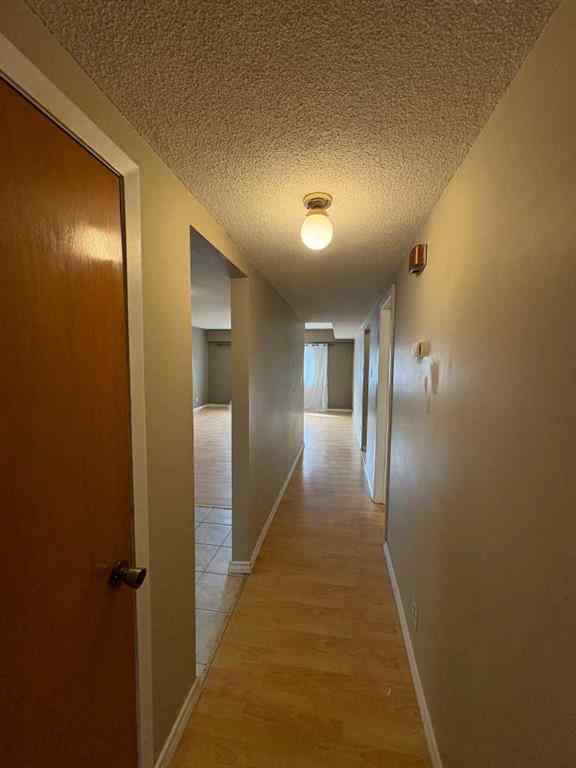 MLS® A2256420 - Unit #1-6 1608 38 Street SW in Rosscarrock Calgary, Multi-Family