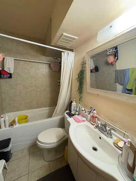 MLS® A2256420 - Unit #1-6 1608 38 Street SW in Rosscarrock Calgary, Multi-Family