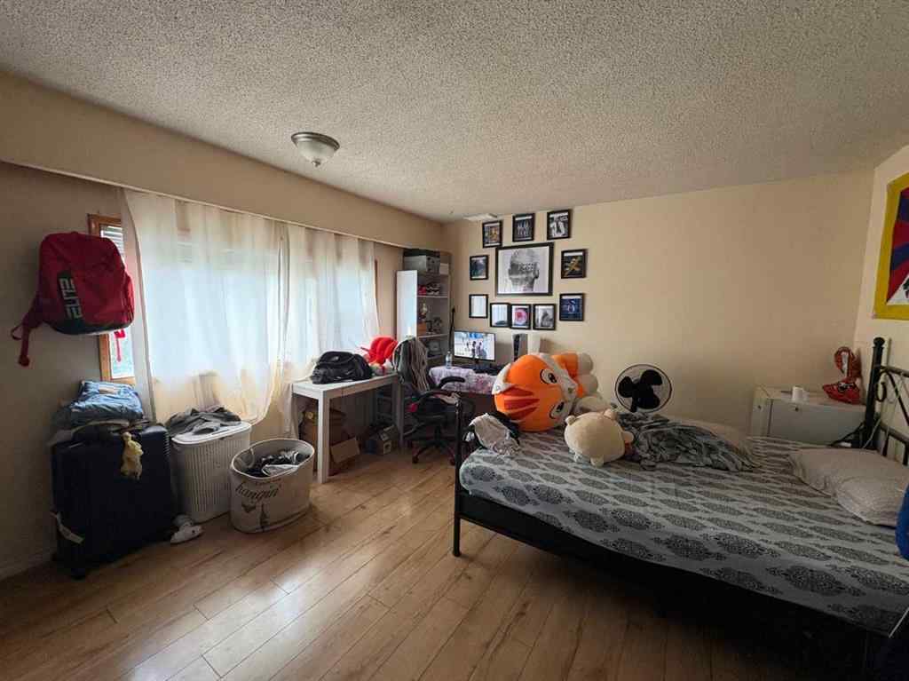 MLS® A2256420 - Unit #1-6 1608 38 Street SW in Rosscarrock Calgary, Multi-Family