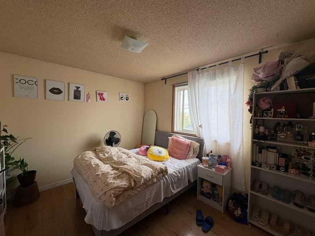 MLS® A2256420 - Unit #1-6 1608 38 Street SW in Rosscarrock Calgary, Multi-Family