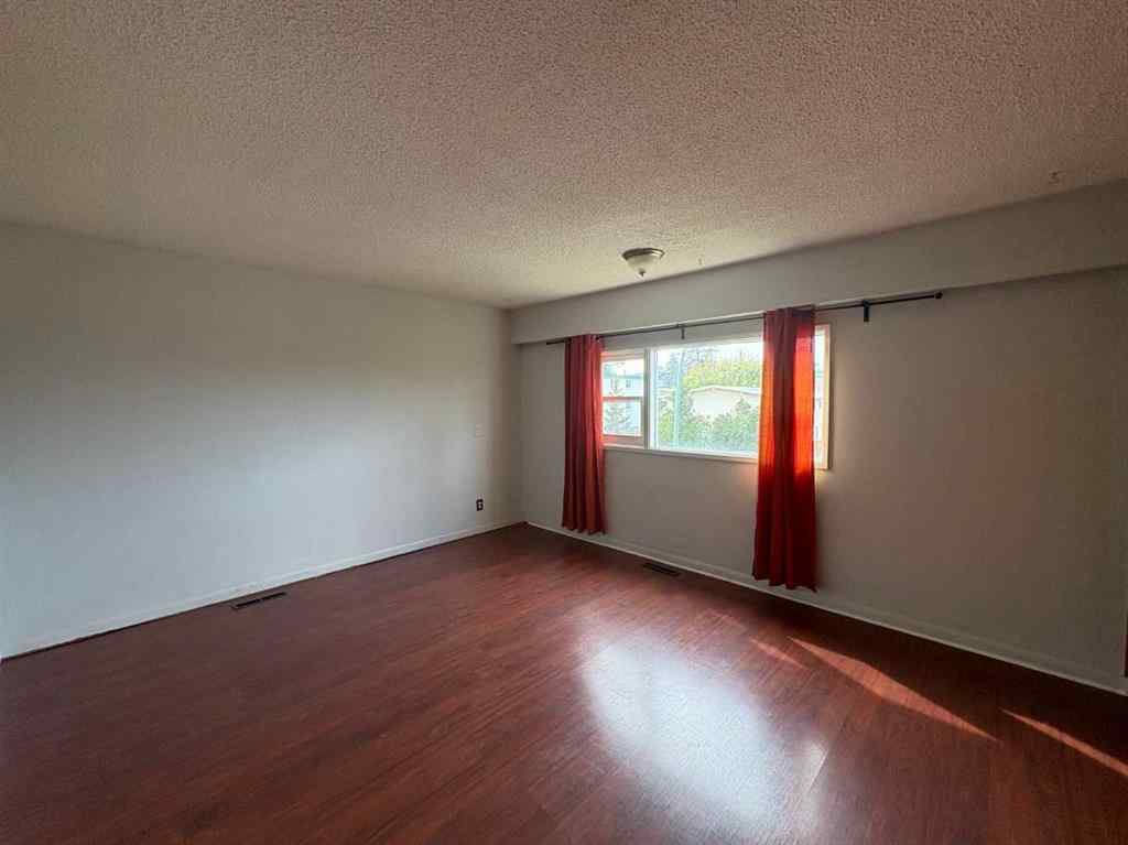 MLS® A2256420 - Unit #1-6 1608 38 Street SW in Rosscarrock Calgary, Multi-Family