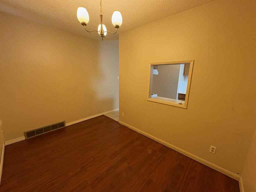 MLS® A2256420 - Unit #1-6 1608 38 Street SW in Rosscarrock Calgary, Multi-Family