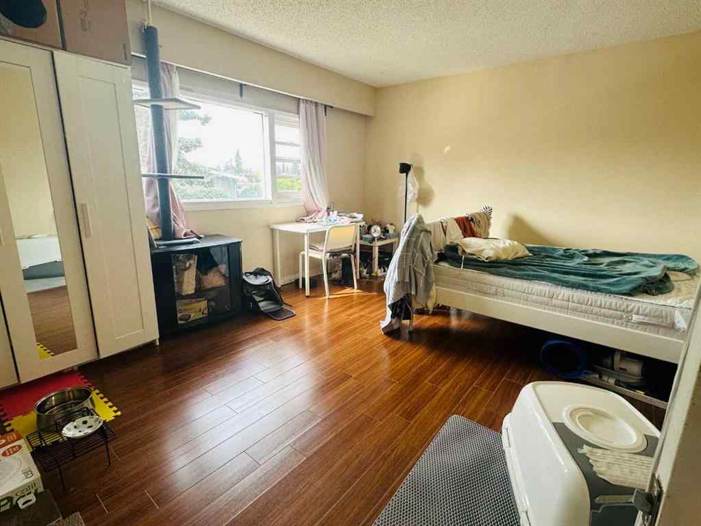 MLS® A2256420 - Unit #1-6 1608 38 Street SW in Rosscarrock Calgary, Multi-Family