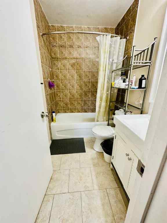 MLS® A2256420 - Unit #1-6 1608 38 Street SW in Rosscarrock Calgary, Multi-Family