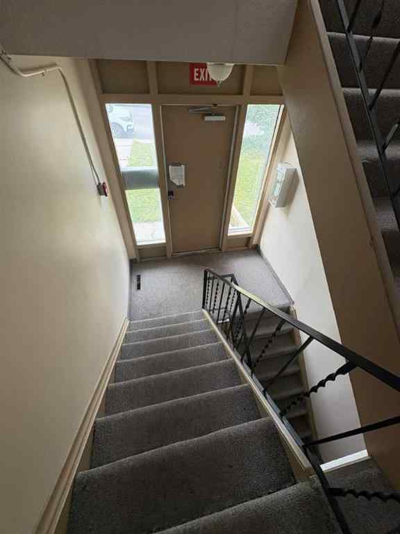 MLS® A2256420 - Unit #1-6 1608 38 Street SW in Rosscarrock Calgary, Multi-Family
