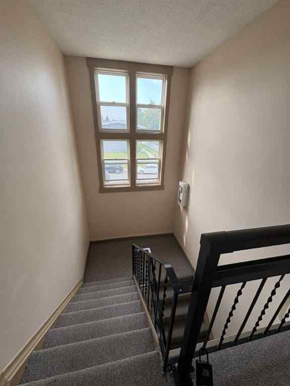 MLS® A2256420 - Unit #1-6 1608 38 Street SW in Rosscarrock Calgary, Multi-Family