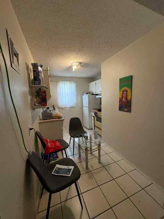MLS® A2256420 - Unit #1-6 1608 38 Street SW in Rosscarrock Calgary, Multi-Family