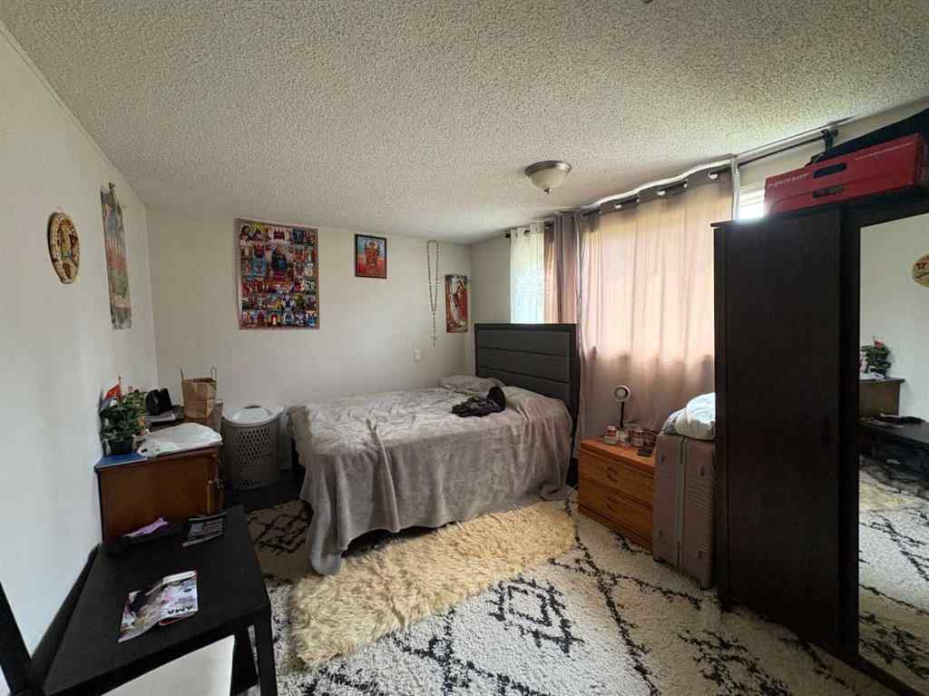 MLS® A2256420 - Unit #1-6 1608 38 Street SW in Rosscarrock Calgary, Multi-Family