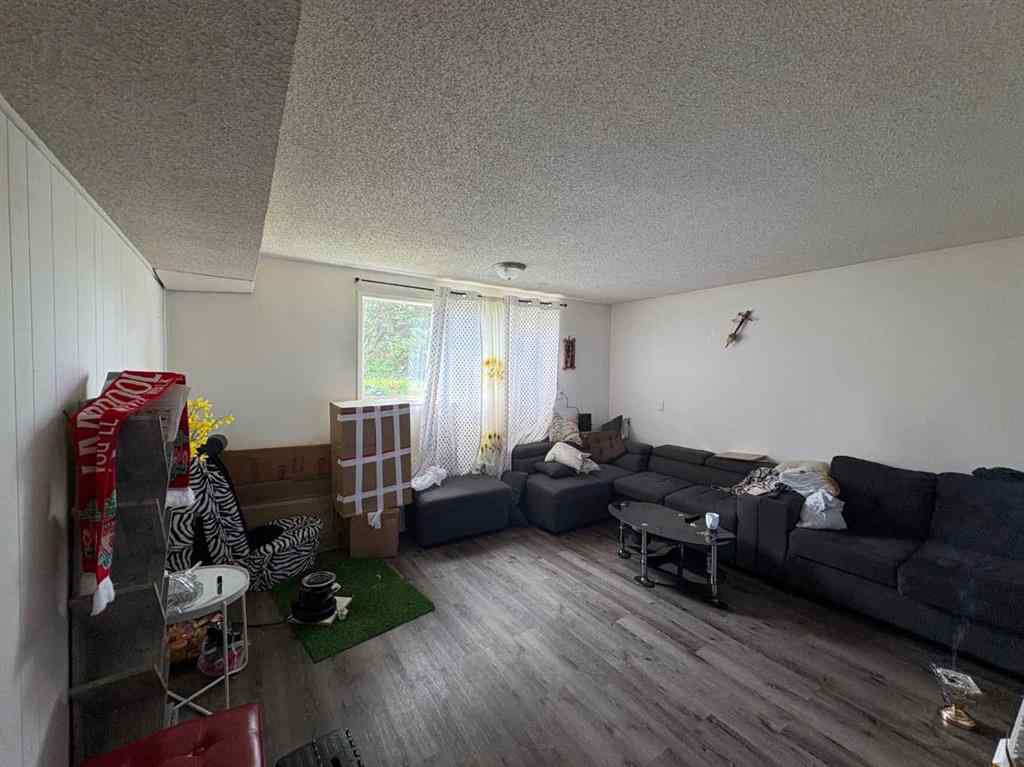 MLS® A2256420 - Unit #1-6 1608 38 Street SW in Rosscarrock Calgary, Multi-Family