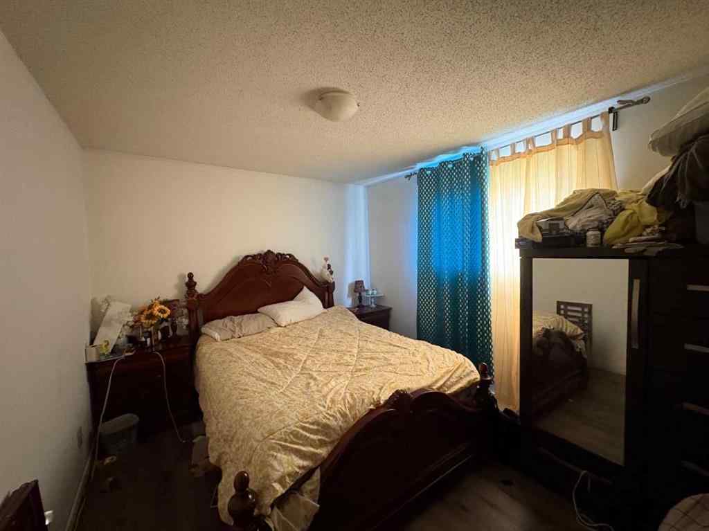 MLS® A2256420 - Unit #1-6 1608 38 Street SW in Rosscarrock Calgary, Multi-Family