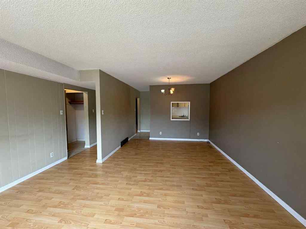 MLS® A2256420 - Unit #1-6 1608 38 Street SW in Rosscarrock Calgary, Multi-Family