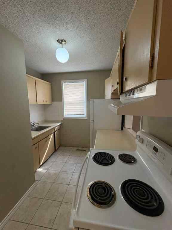 MLS® A2256420 - Unit #1-6 1608 38 Street SW in Rosscarrock Calgary, Multi-Family