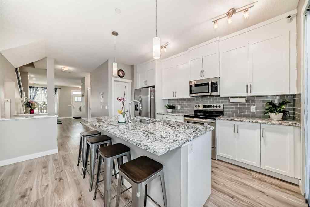 MLS® A2256422 - 720 Livingston Hill NE in Livingston Calgary, Residential