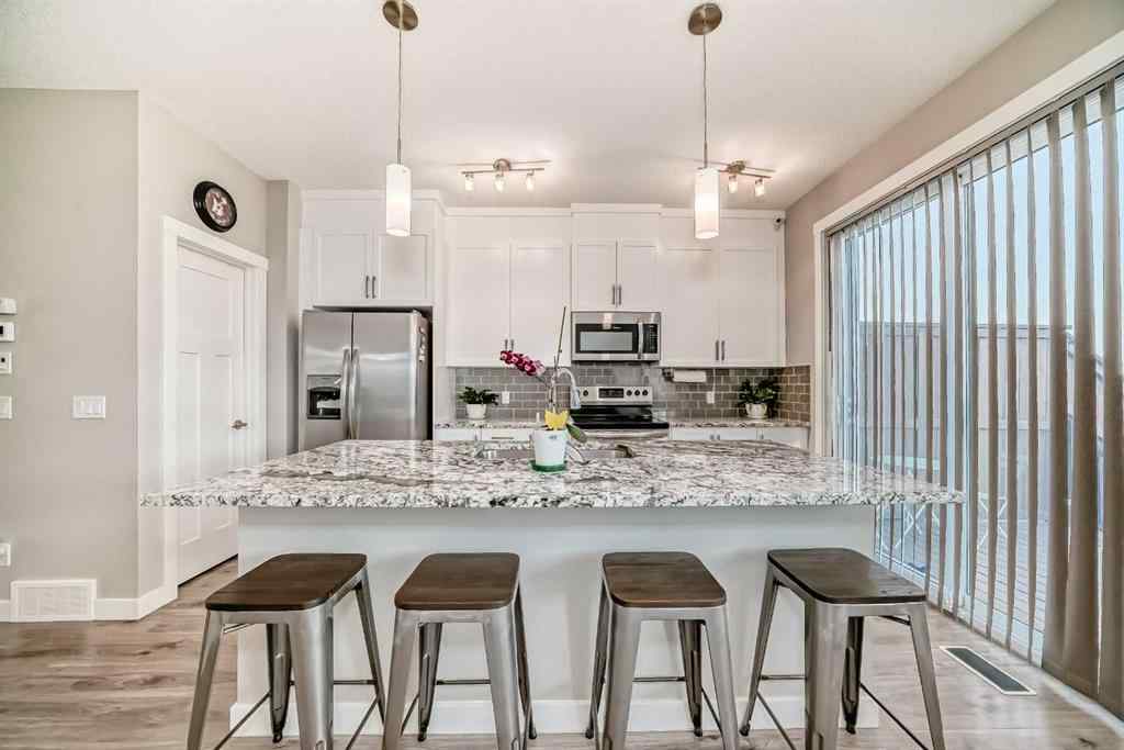 MLS® A2256422 - 720 Livingston Hill NE in Livingston Calgary, Residential
