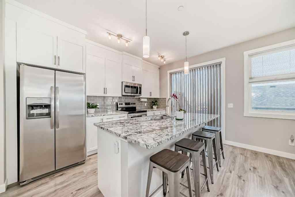 MLS® A2256422 - 720 Livingston Hill NE in Livingston Calgary, Residential