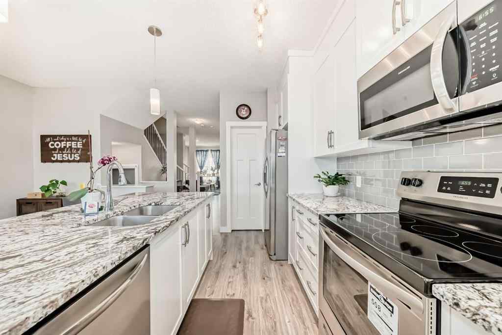 MLS® A2256422 - 720 Livingston Hill NE in Livingston Calgary, Residential