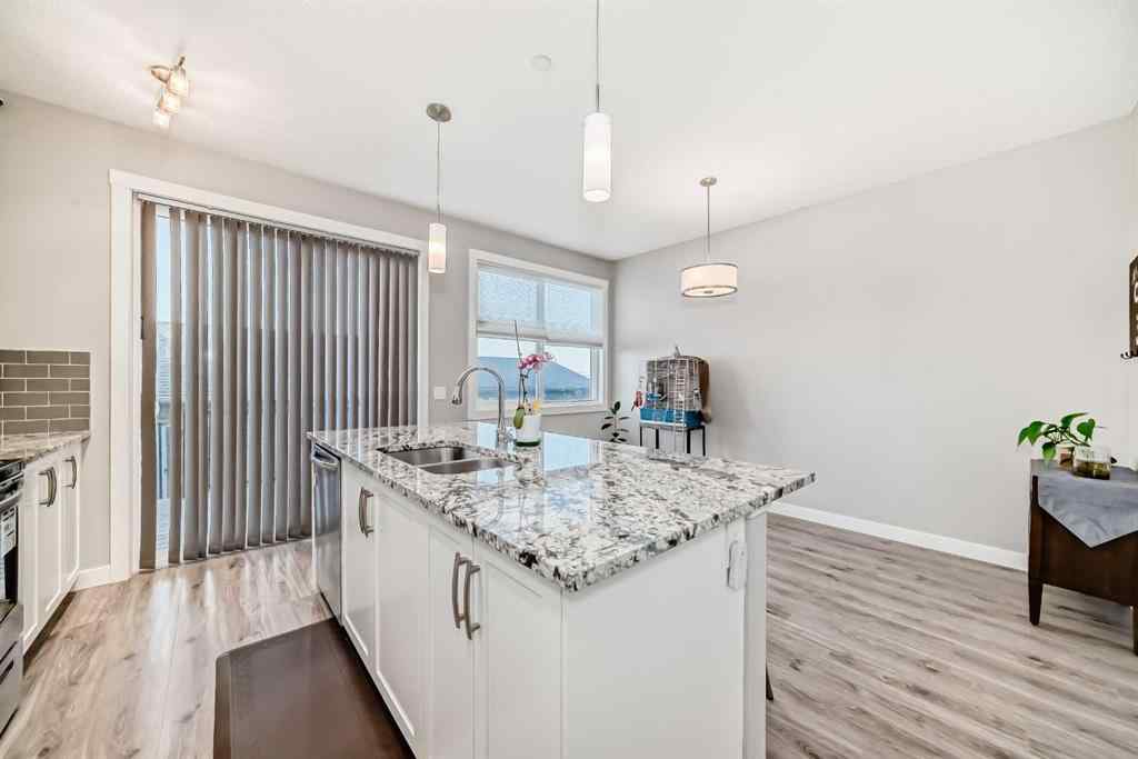 MLS® A2256422 - 720 Livingston Hill NE in Livingston Calgary, Residential