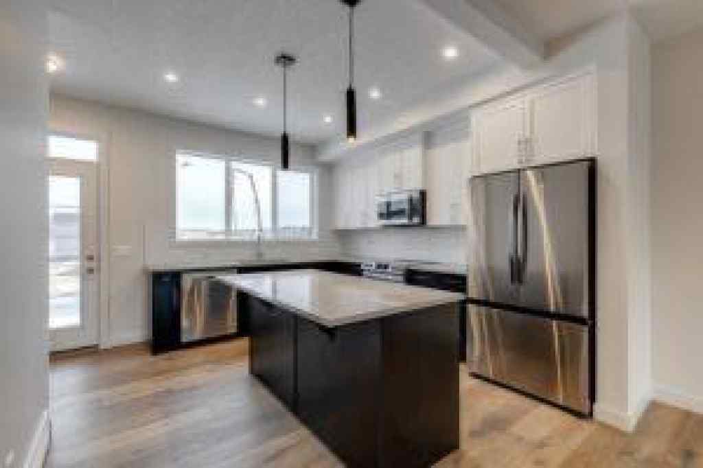 MLS&reg; # A2256459 - 628 Sora Boulevard SE in Hotchkiss Calgary, Residential Open Houses