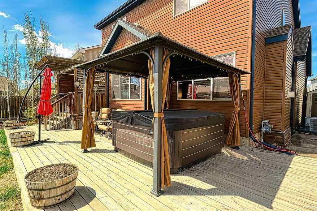 MLS® A2256472 - 709 Hampshire Way NE in Hampton Hills High River, Residential