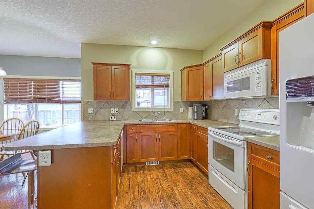 MLS® A2256472 - 709 Hampshire Way NE in Hampton Hills High River, Residential