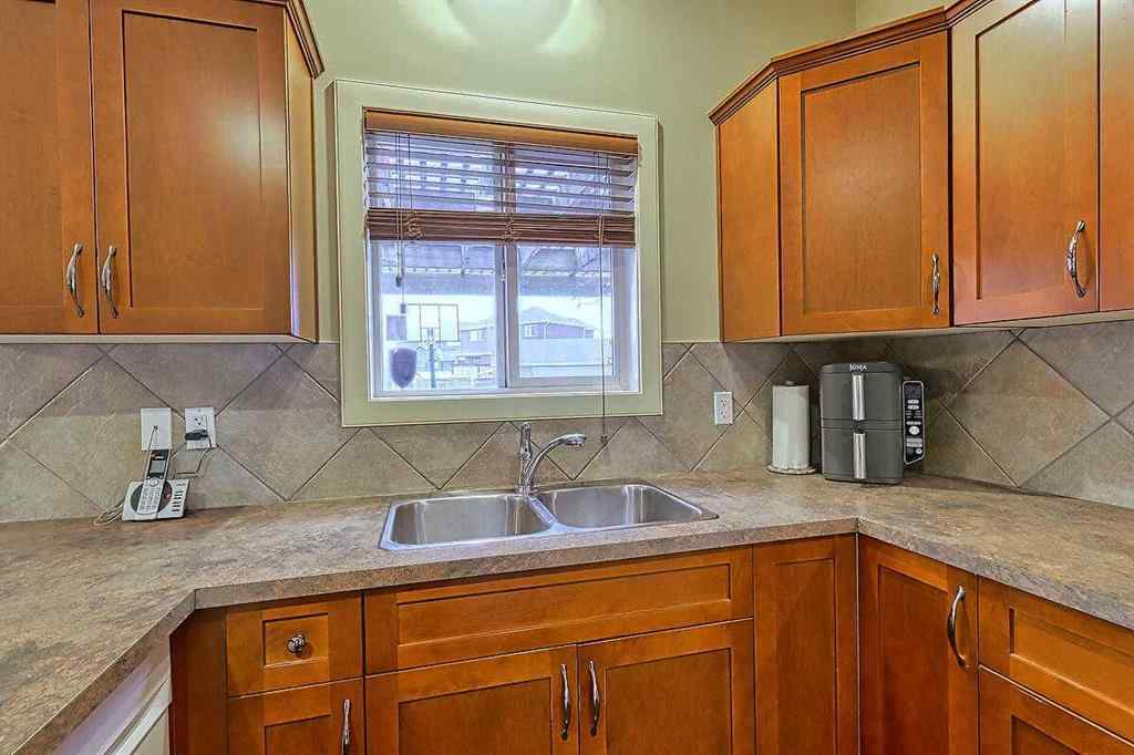 MLS® A2256472 - 709 Hampshire Way NE in Hampton Hills High River, Residential
