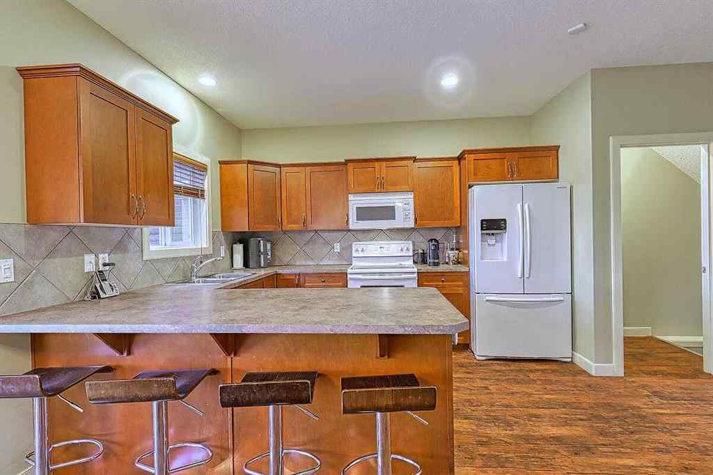 MLS® A2256472 - 709 Hampshire Way NE in Hampton Hills High River, Residential