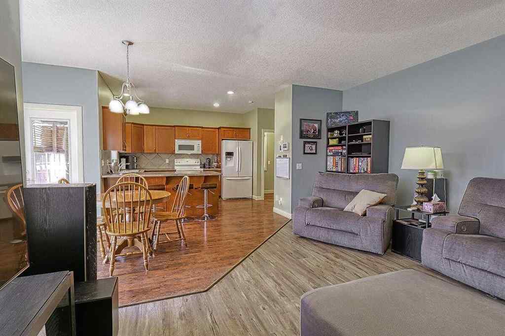 MLS® A2256472 - 709 Hampshire Way NE in Hampton Hills High River, Residential