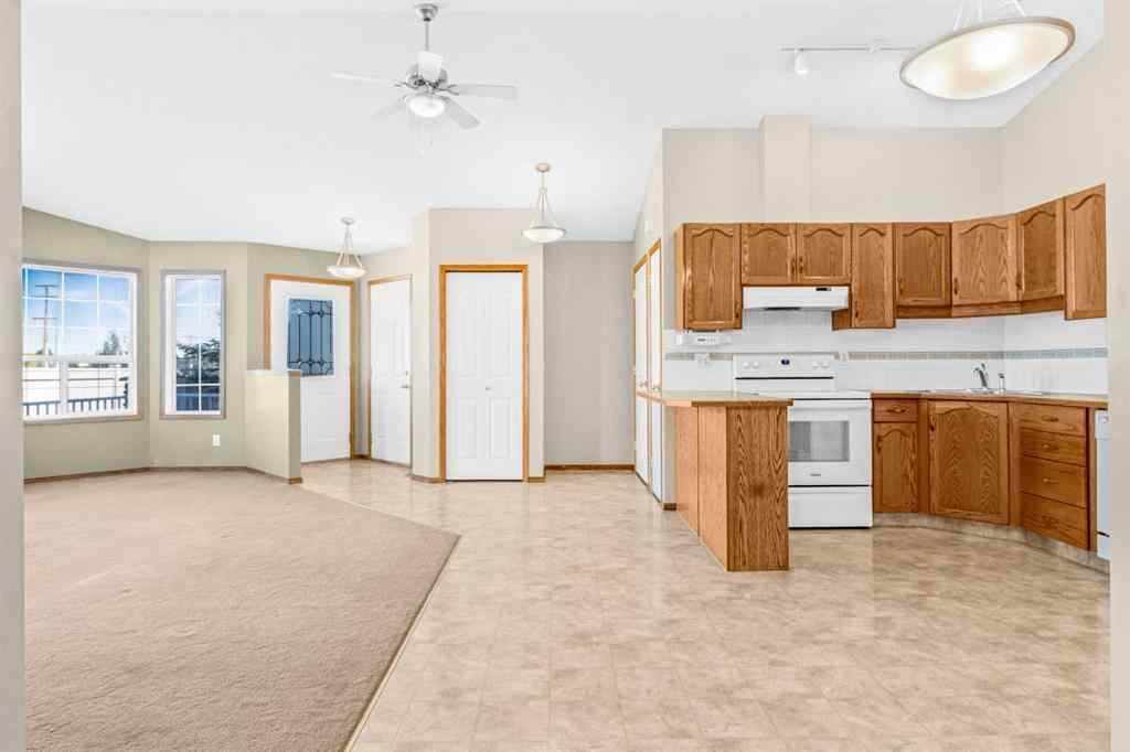 MLS® A2256487 - Unit #43 1008 Woodside Way NW in Woodside Airdrie, Residential