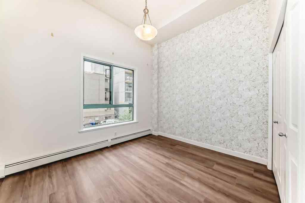 MLS® A2256491 - Unit #209 1111 6 Avenue SW in Downtown West End Calgary, Residential
