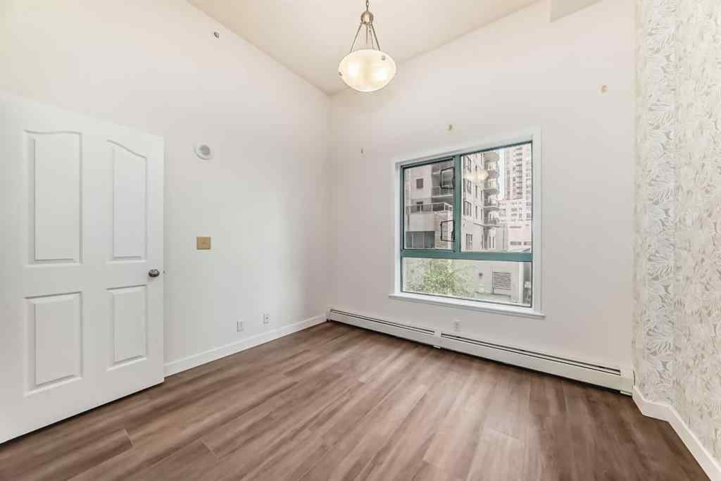 MLS® A2256491 - Unit #209 1111 6 Avenue SW in Downtown West End Calgary, Residential