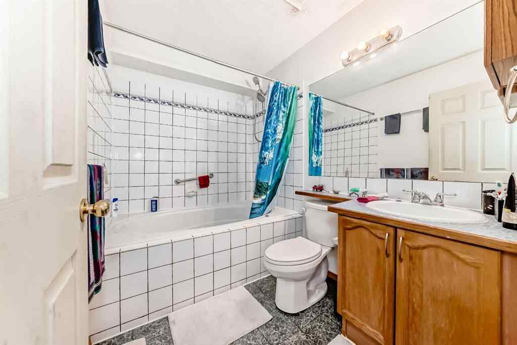 MLS® A2256503 - 128 ERIN MEADOW Way SE in Erin Woods Calgary, Residential