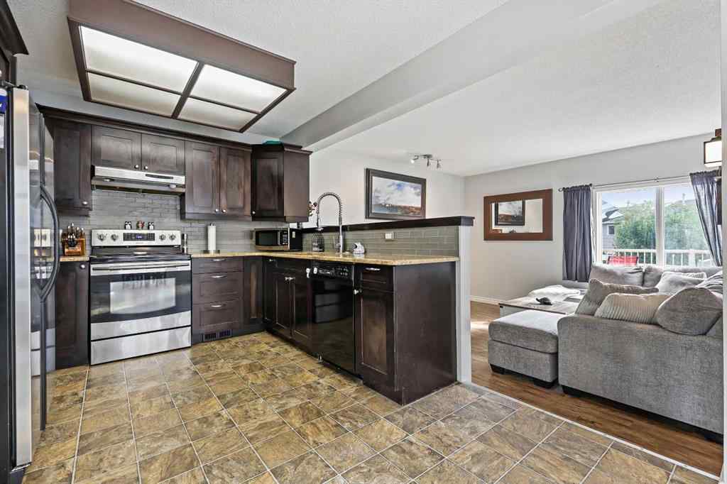 MLS® A2256504 - 32 Millrise Crescent SW in Millrise Calgary, Residential